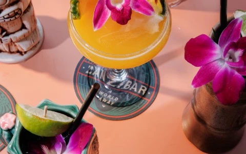 a drink with flowers in it