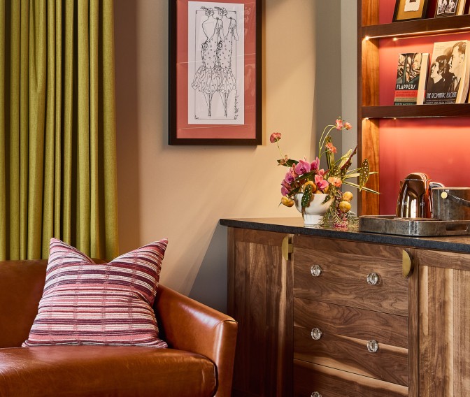 a room with a couch and a bookcase