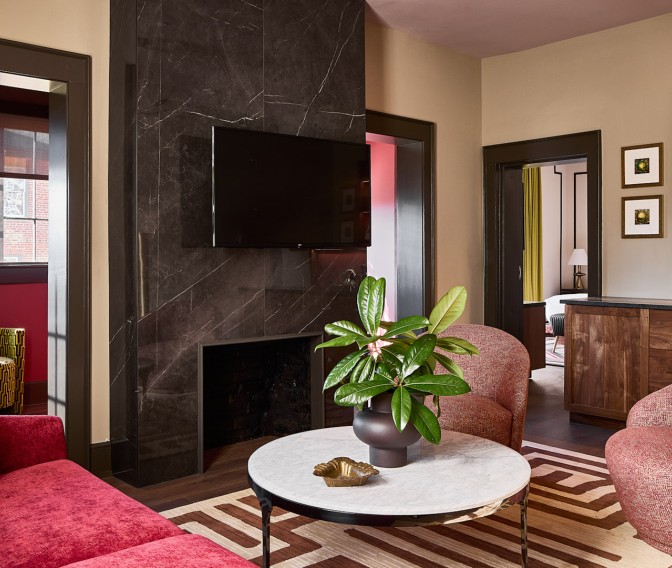 a room with a television and a table