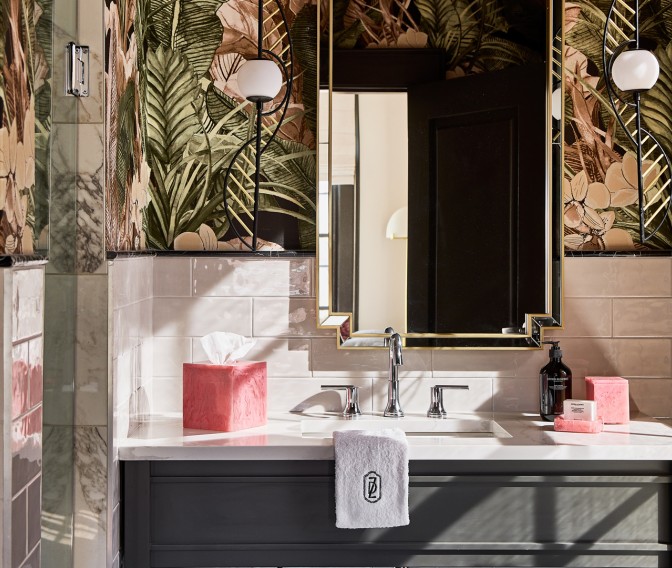 a bathroom with a mirror and a sink