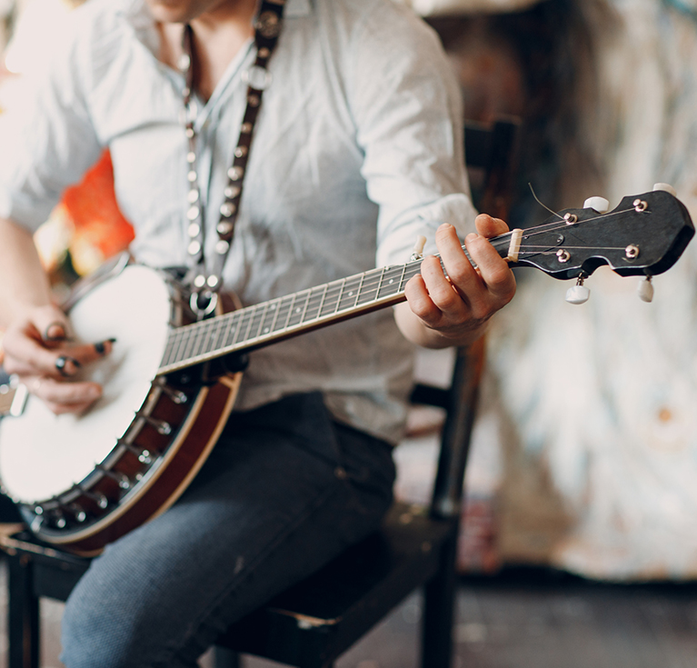 a person playing a banjo