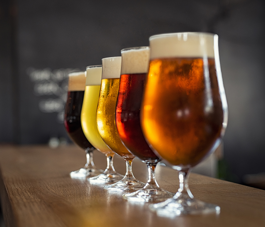 a row of glasses of beer
