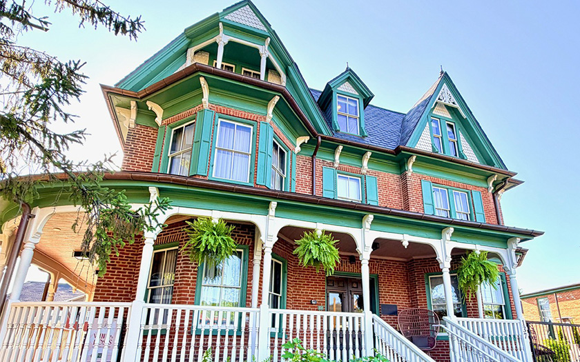 a house with a white railing