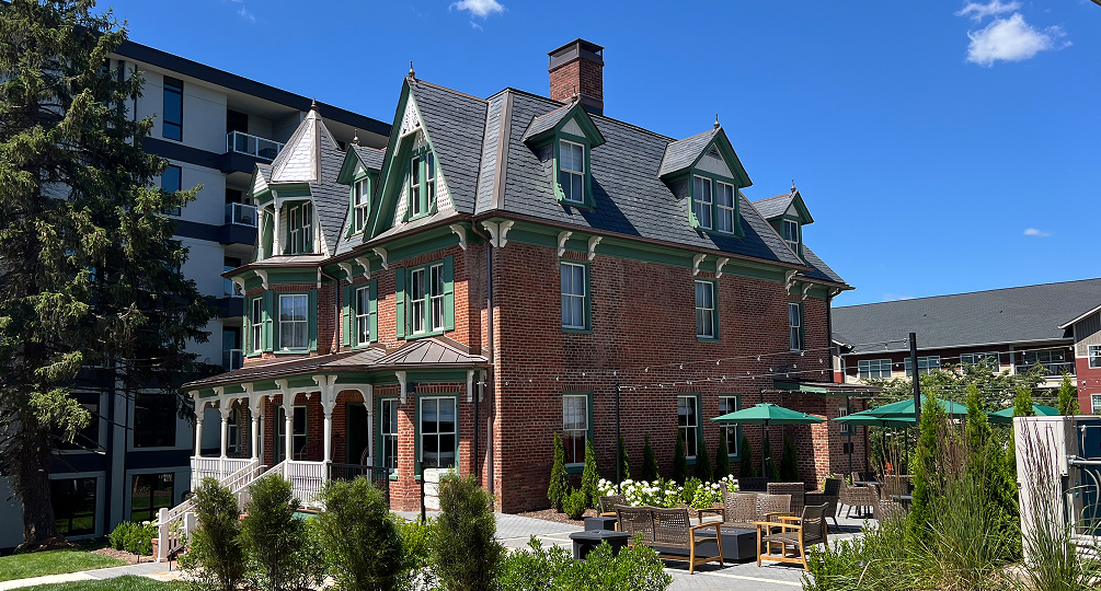 a brick building with a patio area