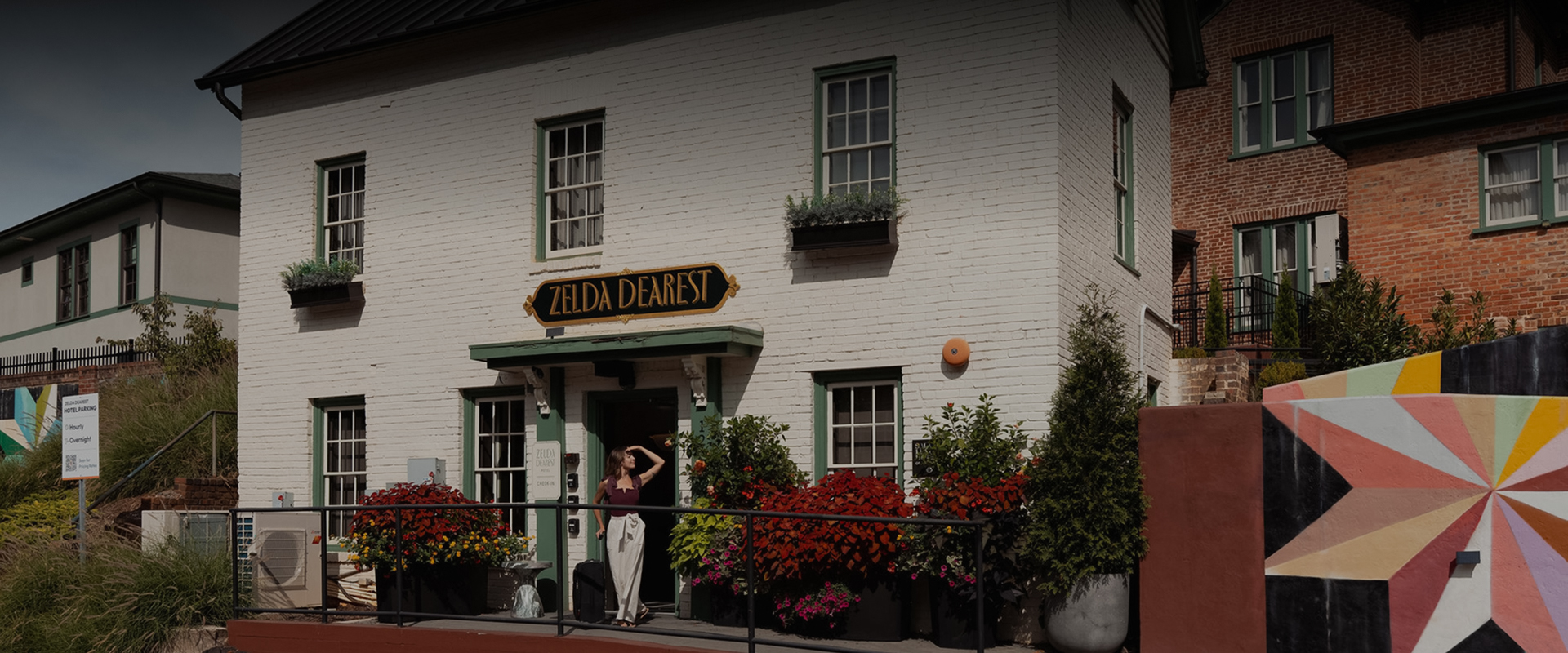 a woman standing in front of a building