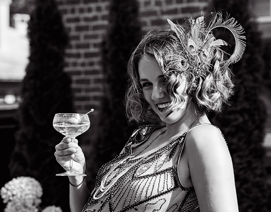 a woman holding a glass of wine