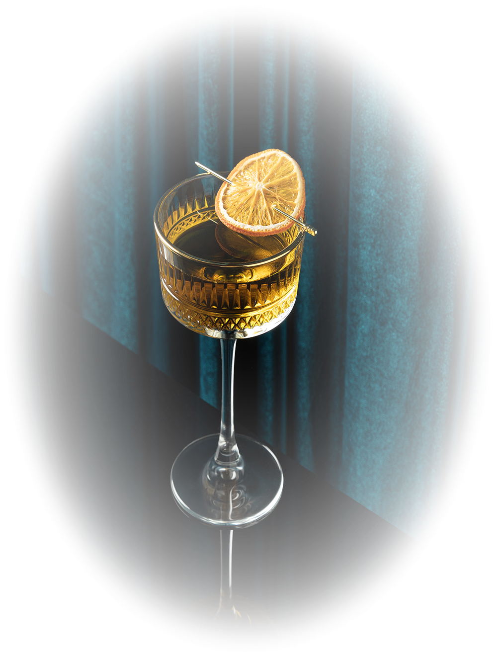 a glass with a slice of lemon on top