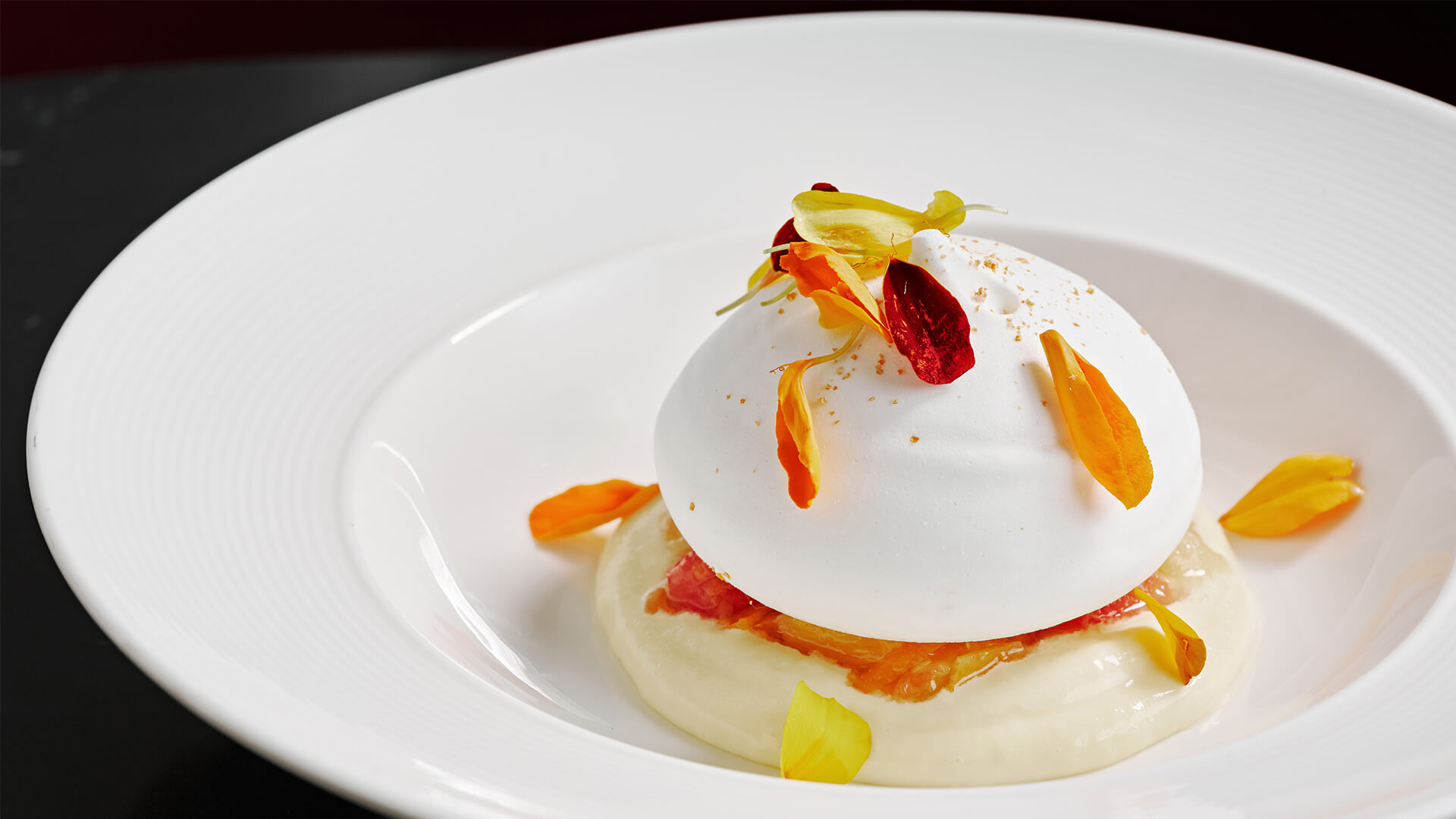 a white dessert with a white layer of food on top