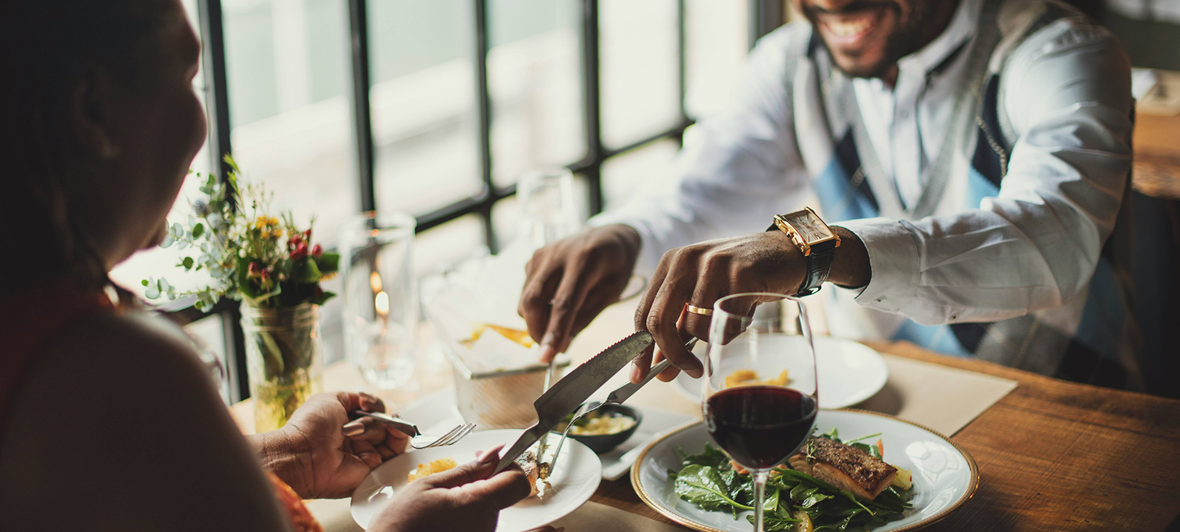 a group of people eating at a table